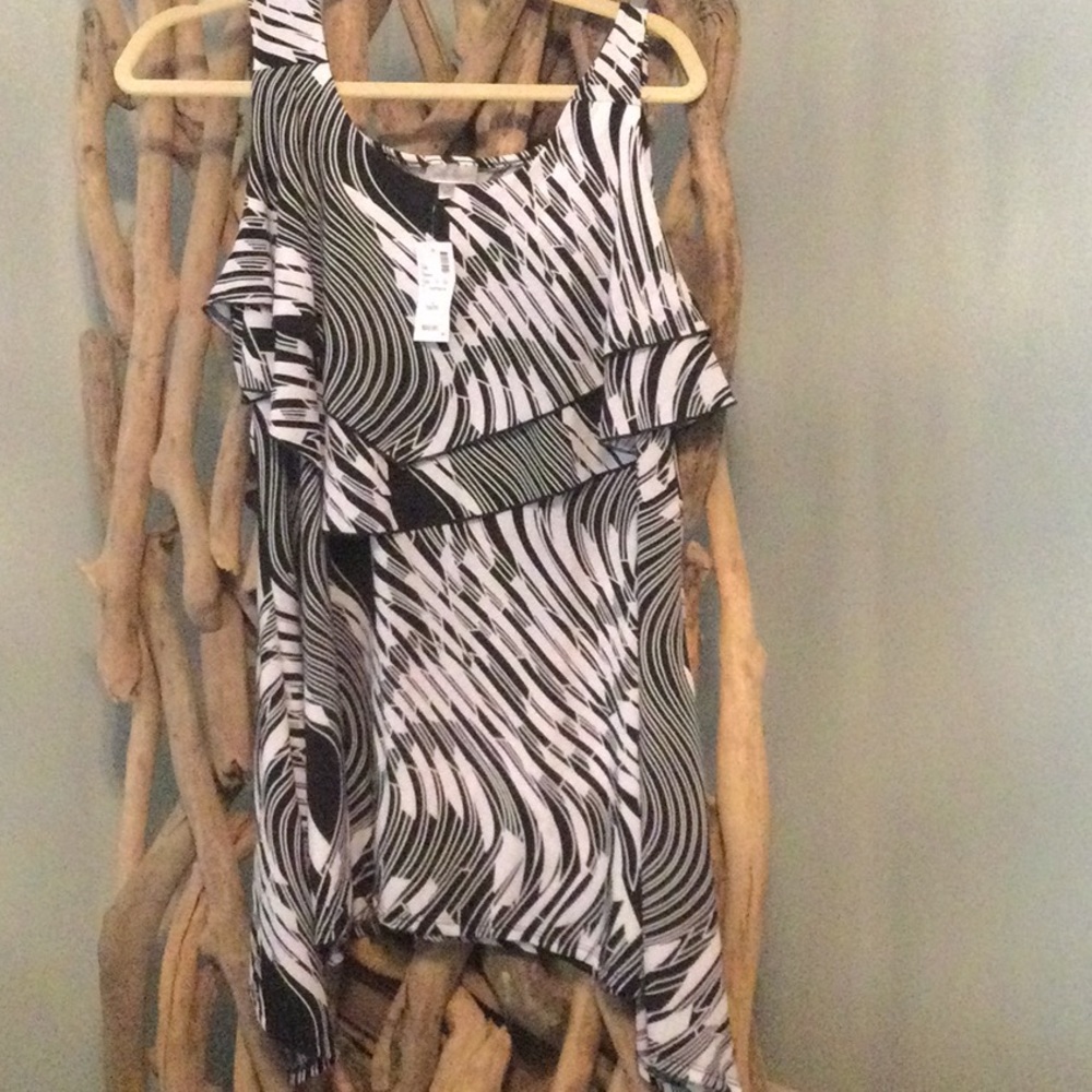 Tank swing top